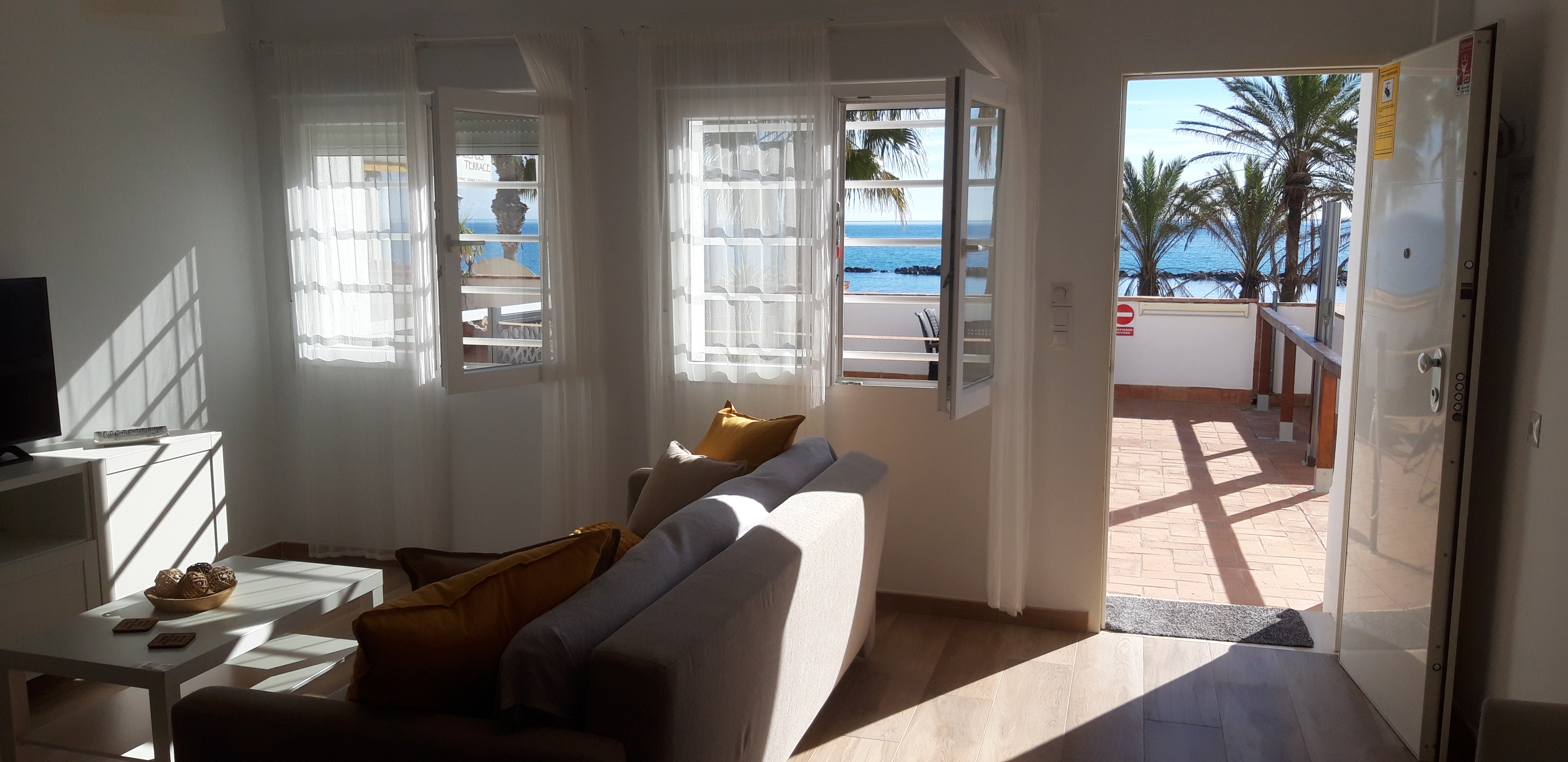 Sunny living room in beachfront loft apartment in Benalmádena Costa del Sol